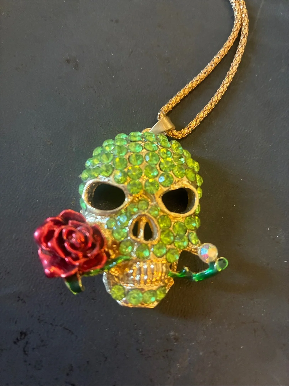 Green Crystal Skull Pendant Necklace with Red Rose Accent
